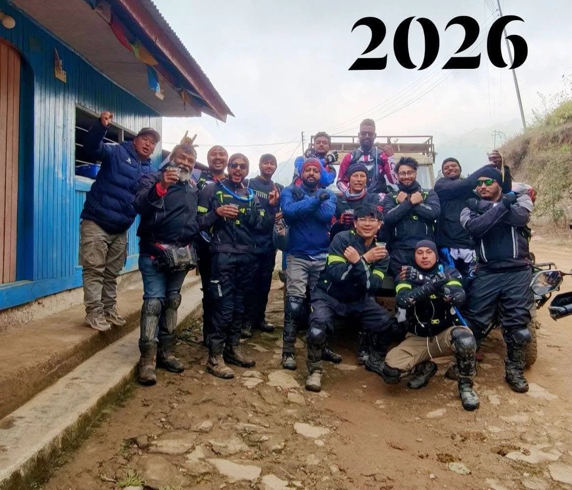 Motology riding crew gathered together during a mountain journey in 2026